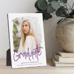 Preppy Purple Script Graduation Photo Plaque<br><div class="desc">Celebrate your graduate's achievement with a custom graduation photo keepsake. The plaque features the graduate's photo inside of a white textured mask frame with "Graduate" in a purple handwritten script. Personalize the graduation photo plaque by adding the graduate's name,  school,  and graduation year.</div>
