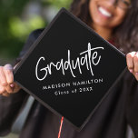 Preppy Script Black and White Graduation Cap Topper<br><div class="desc">Customize your graduation cap by adding a personalized graduation cap topper. The graduation cap topper features "Graduate" in a white handwritten script with a black background or color of your choice. Personalize the black and white graduation cap topper by adding the graduate's name and graduation year.</div>