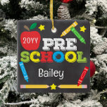 Preschool Keepsake Chalkboard Colorful Kids Ceramic Ornament<br><div class="desc">Pre-school ornament design features an apple, a ruler, crayons and bold, colorful fun typography! Click the customize button for more options for modifying the text! Variations of this design, additional colors, as well as coordinating products are available in our shop, zazzle.com/store/doodlelulu. Contact us if you need this design applied to...</div>
