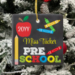 Preschool Teacher Keepsake Chalkboard Colorful Ceramic Ornament<br><div class="desc">Pre-K teacher ornament design features an apple, a ruler, crayons and bold, colorful fun typography! Click the customize button for more options for modifying the text! Variations of this design, additional colors, as well as coordinating products are available in our shop, zazzle.com/store/doodlelulu. Contact us if you need this design applied...</div>