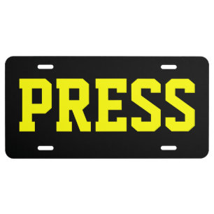 PRESS LICENSE PLATE