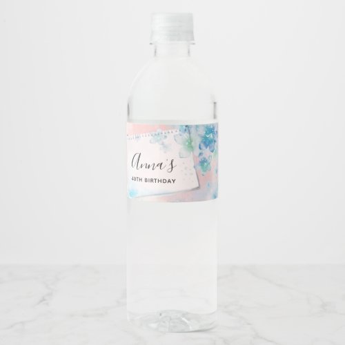 Pretty Blue Flowers on Pink Background Water Bottle Label