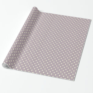 Pretty cream dots on pastel purple wrapping paper