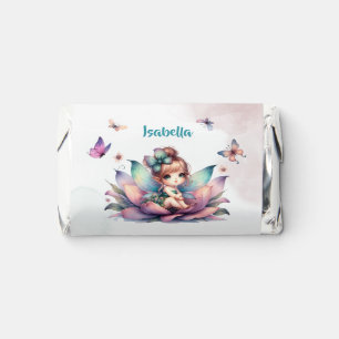 Pretty fairy sitting inside flower hershey's miniatures