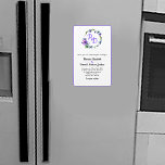Pretty Floral Wreath Monogrammed Wedding Invitatio Magnet<br><div class="desc">Pretty wedding invitation magnet done in white matte, with a lavender then frame, around the outer edge. Graphics of a colorful floral wreath, at the top of the invitation, has the bride and groom's initials done in lavender. Personalize all the custom text fields to suit your wedding needs. Matching products...</div>