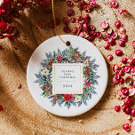 Pretty Holiday Wreath | Baby's First Christmas Ceramic Ornament<br><div class="desc">This beautiful ornament features a lovely watercolor style holiday wreath with green pine leaves and branches, red Christmas berries, pine cones, and red and cream colored flowers.. A square frame with a faux gold border is in the center, and you can personalize with your baby's name and any message or...</div>