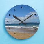 Pretty Ocean Tide Round Clock<br><div class="desc">This beautiful clock is perfect to decorate a cute beach house. Small blue waves roll up on a gorgeous beach under pretty clouds. I love the coast.</div>