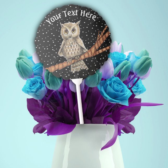 Pretty owl Wearing a Blue Necklace on Branch Stars Balloon (Brown owl wearing blue necklace sitting on branch with black sky and stars on mylar balloon.)