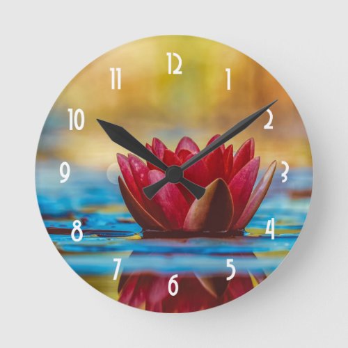 Pretty Photo of a Lotus Flower in a Pond Round Clock