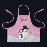 Pretty Pink Christmas Snowman Personalized Kids   Apron<br><div class="desc">This small size Christmas apron was created for kids/girls to wear to bake holiday cookies,  paint or play in throughout the winter season. The design features a pretty pink background with snowflakes,  snow,  and snowmen. Personalize this cute apron with your child's name.</div>