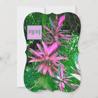 PRETTY PINK TROPICAL PLANTS AND PALM LEAVES