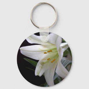 Pretty, pure white Easter lily flower in black Keychain