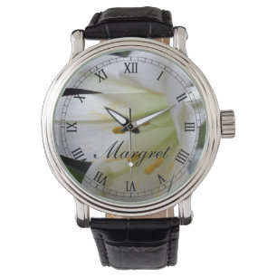 Pretty, pure white Easter lily flower in black Watch