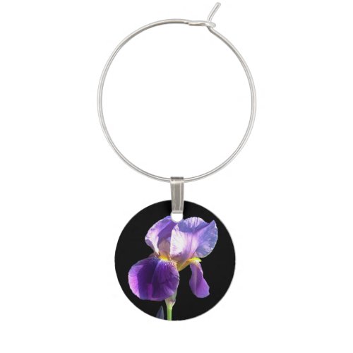 pretty purple iris flower in black background wine glass charm