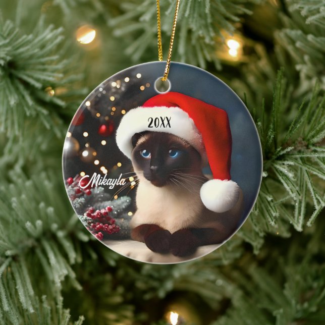 Pretty Siamese Cat in a  Santa Hat Christmas Ceramic Ornament (Tree)