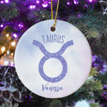 Pretty Taurus Astrology Sign Personalized Purple Ceramic Ornament<br><div class="desc">This pretty,  personalized purple and lavender Taurus Christmas ornament features your astrological sign from the Zodiac in a beautiful sparkle like the constellations. Customize this cute astrology symbol gift with your name in beautiful cursive script for someone with a late April or early May birthday.</div>