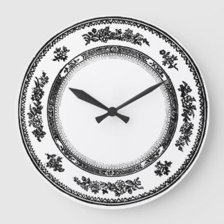 pretty vintage black and white china plate clock