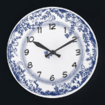 pretty vintage blue delft plate clock<br><div class="desc">pretty vintage blue delft plate clock. This blue and white plate clock is based on the popular and collectible antique delft plates seen in country kitchens the world over. This clock would look great in a traditional kitchen or living room or over a pine dresser. Makes a great gift for...</div>