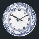 pretty vintage blue delft plate clock<br><div class="desc">pretty vintage blue delft plate clock. This blue and white plate clock is based on the popular and collectible antique delft plates seen in country kitchens the world over. This clock would look great in a traditional kitchen or living room or over a pine dresser. Makes a great gift for...</div>