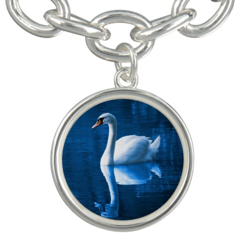 Pretty white swan floating on a blue lake bracelet