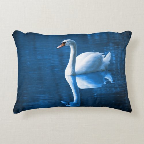 Pretty white swan floating on a blue lake decorative pillow