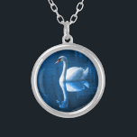 Pretty white swan floating on a blue lake silver plated necklace<br><div class="desc">A lovely nature scene of a white swan swimming on a peaceful blue lake. The dark blue shadows contrasts nicely with the soft blue lighting on this peaceful swan.</div>
