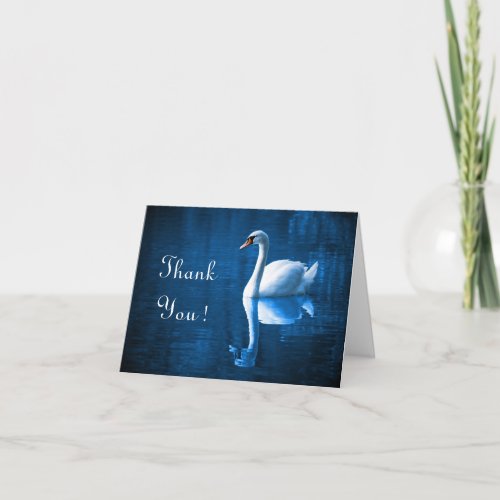 Pretty white swan floating on a blue lake thank you card