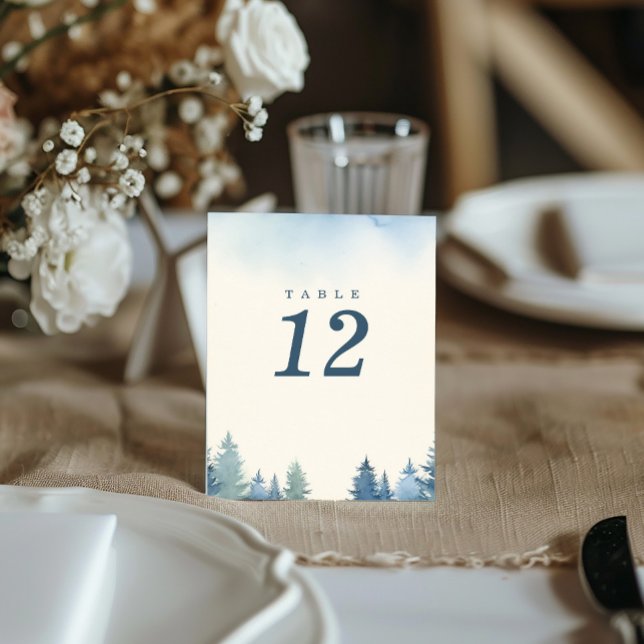 Pretty winter pine trees blue table number (Minimalist, elegant winter pine trees wedding reception table number card)