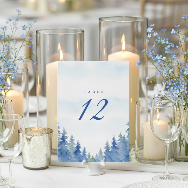 Pretty winter pine trees reception table number (Blue pine trees wedding table number place card.)
