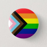 Pride Flag Reboot - trans and POC inclusive Button<br><div class="desc">It's a twist on the traditional rainbow flag,  created by artist Daniel Quasar,  that includes black and brown stripes for people of color and the colors of the trans flag in an arrow to indicate progress.</div>