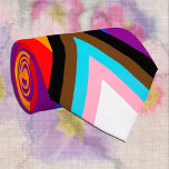 Pride Tie & Progress Rainbow Flag / LGBTQ<br><div class="desc">Neck Tie: Rainbow Flag & the "Progress" variation adds a chevron along the hoist that features black, brown, light blue, pink, and white stripes to bring those communities (marginalized people of color, trans individuals, and those living with HIV/AIDS and those who have been lost) to the forefront; "the arrow points...</div>