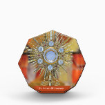 Priest Ordination Anniversary Monstrance Host Acrylic Award<br><div class="desc">Honor a priest's remarkable 50th ordination anniversary with this stunning image. Featuring an exquisite gold monstrance with the Blessed Sacrament against a vibrant stone background, the image radiates reverence and celebration. This special milestone deserves recognition, and the heartfelt message conveys blessings and appreciation for five decades of faithful service. Celebrate...</div>