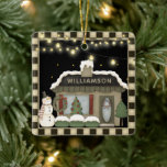 Primitive Country Christmas Cottage with Snowman Ceramic Ornament<br><div class="desc">Primitive Country Christmas Cottage with primitive snowman. This country cottage is all decked out for the holidays with a Christmas tree,  primitive snowman,  christmas wreaths. A string of lit vintage string lights hangs overhead. Ornament is personalized. This adorable ornament would make a lovely gift.</div>