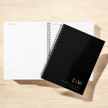 Professional Black and Gold Monogram Initial Planner<br><div class="desc">Stay organized in style with this Professional Black and Gold Monogram Initial Planner. Featuring a sleek black cover with a bold faux gold monogram, this planner combines elegance with everyday functionality. Whether you're scheduling meetings, tracking goals, or managing tasks, this customizable planner is perfect for professionals, students, or entrepreneurs who...</div>