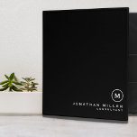 Professional Black White Monogram Initial 3 Ring Binder<br><div class="desc">Modern professional binder features a minimal design in a classic black and white color palette. Custom name presented in the lower right hand corner in stylish simple font with a complimentary minimal monogram medallion. Shown with a custom name and monogram initial on the front in modern typography, this personalized business...</div>