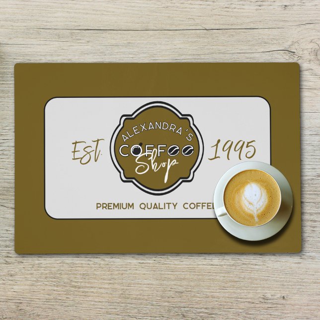 Professional Coffee Shop Personalized Logo Placemat (Coffee shop laminated placemat with logo on a table with a coffee cup on it.)