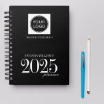 Professional Company Logo Custom Black 2025  Planner<br><div class="desc">Stay organized and inspired in 2025 with this sleek and professional personalized planner, perfect for corporate gifting. Featuring a customizable cover for your company logo, recipient’s name, or business branding, this minimalist black and white design exudes timeless elegance suitable for any industry. Crafted with durable spiral binding and premium materials,...</div>