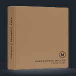 Professional Minimalist Monogram 3 Ring Binder<br><div class="desc">Modern professional binder features a minimal design in a tan and black color palette. Custom name presented in the lower right-hand corner in stylish simple font with a complimentary minimal monogram medallion. Shown with a custom name and monogram initial on the front in modern typography, this personalized business binder is...</div>
