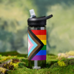 Progress Rainbow Flag, Pride, LGBTQ Water Bottle<br><div class="desc">Watter Bottle: Rainbow Flag & the "Progress" variation adds a chevron along the hoist that features black, brown, light blue, pink, and white stripes to bring those communities (marginalized people of color, trans individuals, and those living with HIV/AIDS and those who have been lost) to the forefront; "the arrow points...</div>