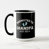 Promoted grandpa est. 2023 pregnancy announcement mug (Left)