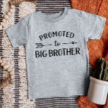 Promoted to Big Brother Matching Sibling Baby T-Shirt<br><div class="desc">Custom printed apparel personalized with "Promoted to Big Brother" graphic in trendy modern fonts with a boho arrow design. Perfect for a pregnancy announcement photo or a gift for older siblings when new baby arrives! Use the design tools to edit the colors or add your own text and photos to...</div>