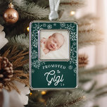 Promoted to Gigi | Baby Photo Grandma Christmas Ornament<br><div class="desc">Celebrate his first Christmas as a grandmother with this sweet photo ornament featuring a baby photo framed by falling white snowflakes on a forest green background. "Promoted to Gigi" appears beneath in white rustic lettering,  along with the year.</div>