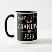 Promoted to grandma 2023 pregnancy announcement mug (Left)