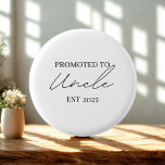 Promoted to Uncle EST Button | Cute New Uncle Gift<br><div class="desc">Celebrate the exciting news with this Promoted to Uncle EST 2025 button – the perfect accessory for a first-time uncle! Whether you’re sharing a pregnancy announcement, planning a baby shower, or simply want a fun keepsake, this minimalist badge makes a heartfelt gift. With a sleek black script design on a...</div>