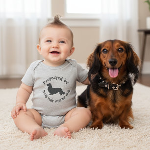Protected by a Long Hair Wiener Dog Baby Outfit  Bodysuit