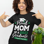 Proud Mom of 2024 graduate black green cap tassel  T-Shirt<br><div class="desc">Celebrate your son's or daughter's graduation with this modern t-shirt featuring a "Proud MOM of a 2024 Graduate" typography in white and green fonts decorated with a black grad cap with a green tassel; easily customize this t-shirt with the graduation year and the name of the graduate by editing the...</div>
