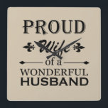 proud wife of a wonderful husband square wall clock<br><div class="desc">This original proud wife of a wonderful husband graphic design with awesome typography font lettering is a great birthday and holiday gift idea for all appreciated, special, and amazing husbands and wives! The best and most fun holiday present for your awesome wife. The best funny text illustration for your wardrobe...</div>