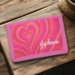 Psychedelic Hearts Calligraphy Script Name Pinks Trifold Wallet<br><div class="desc">A funky heart pattern with pastel pinks and reds. The modern script adds a funky, modern touch to this retro design. Add your name or delete the text for a fun girly design. The name is a trendy script in a large white size. If you click on the customize link,...</div>