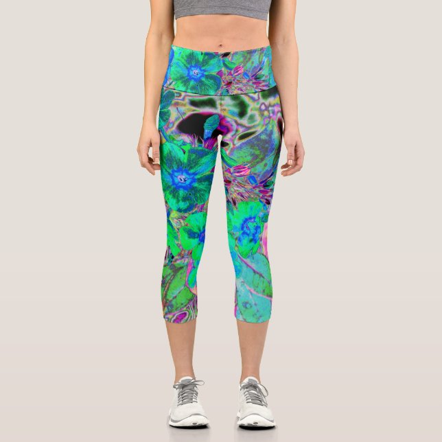 Psychedelic Trippy Lime Green and Blue Flowers Capri Leggings (Front)