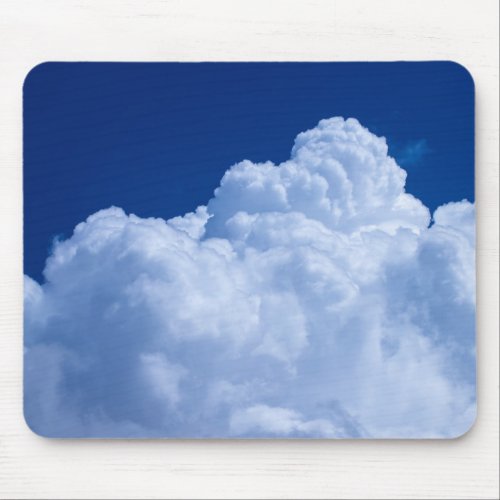 Puffy clouds in blue sky mouse pad